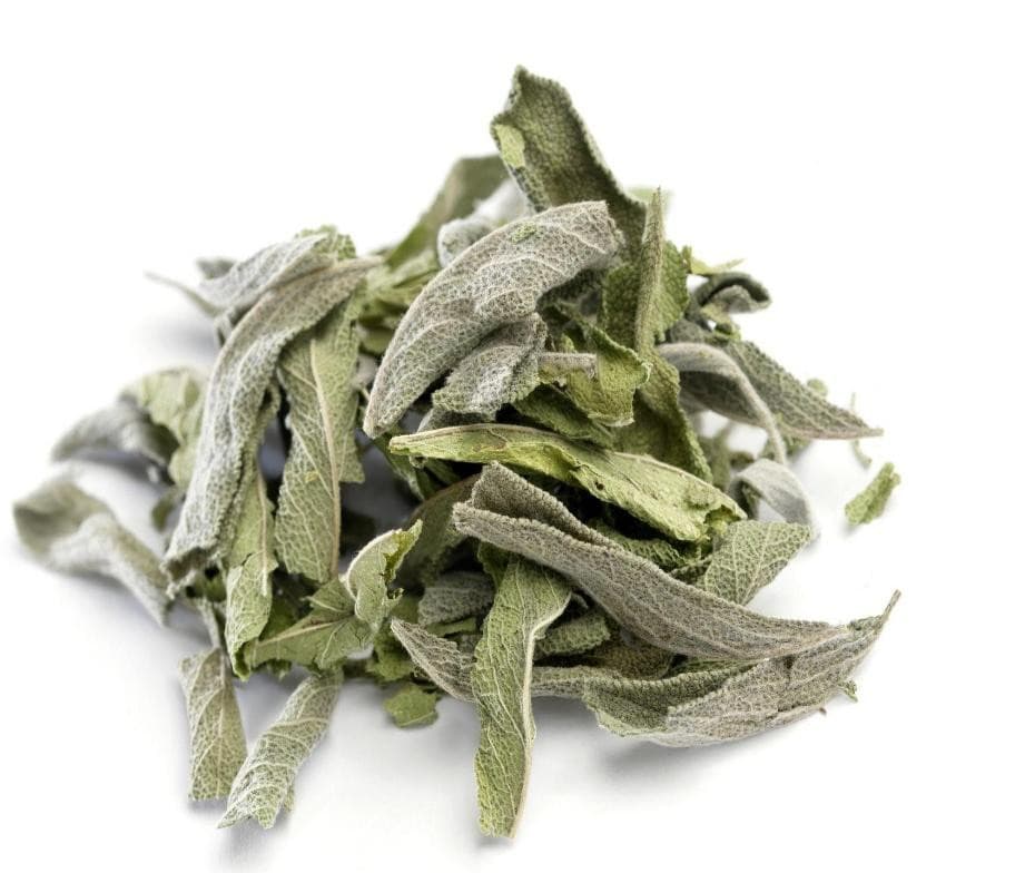 Pile of dried sage leaves on a white background