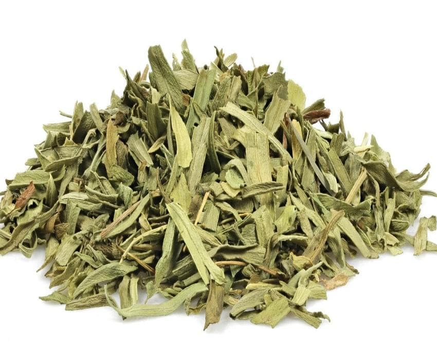Pile of dried tarragon leaves on a white background